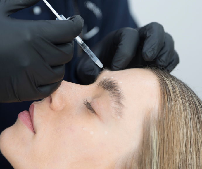Close-up of a woman during Botox treatment