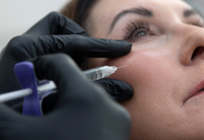 Anti-Wrinkle Injection being administered to the side of the eye